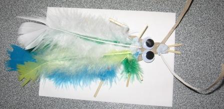 Students see live waterbugs from the creek and then make their own