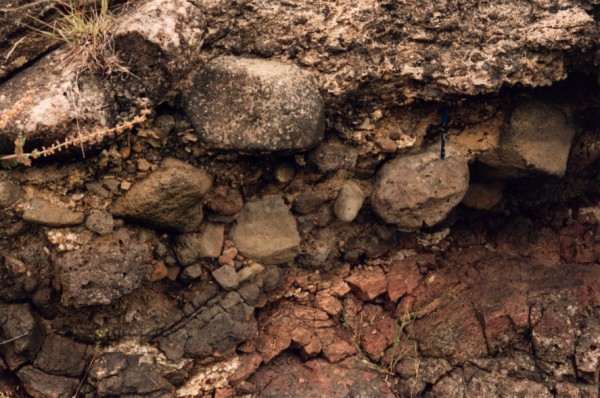 Basal conglomerate of basalt boulders in the sediments at Merri Creek at O'Hearns Road Somerton, Victoria, Australia